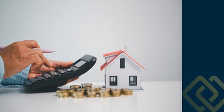 Person using home affordability calculator to determine budget.