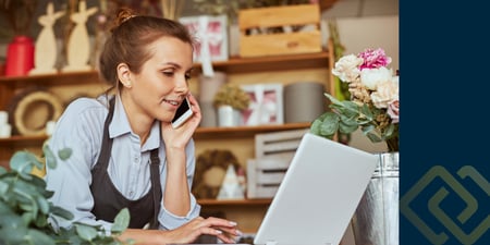 Self-employed professional reviewing mortgage documents at desk